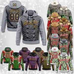 May include: A selection of hooded sweatshirts with diverse patterns. The sweatshirts display a reptile skin design in grey, green, brown, and purple. Each hoodie has a hood, long sleeves, and the number "00". Some have "Team Name" or "Your Name" printed on them.