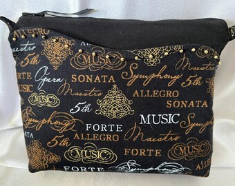 Bolso de hombro pequeño con temática musical