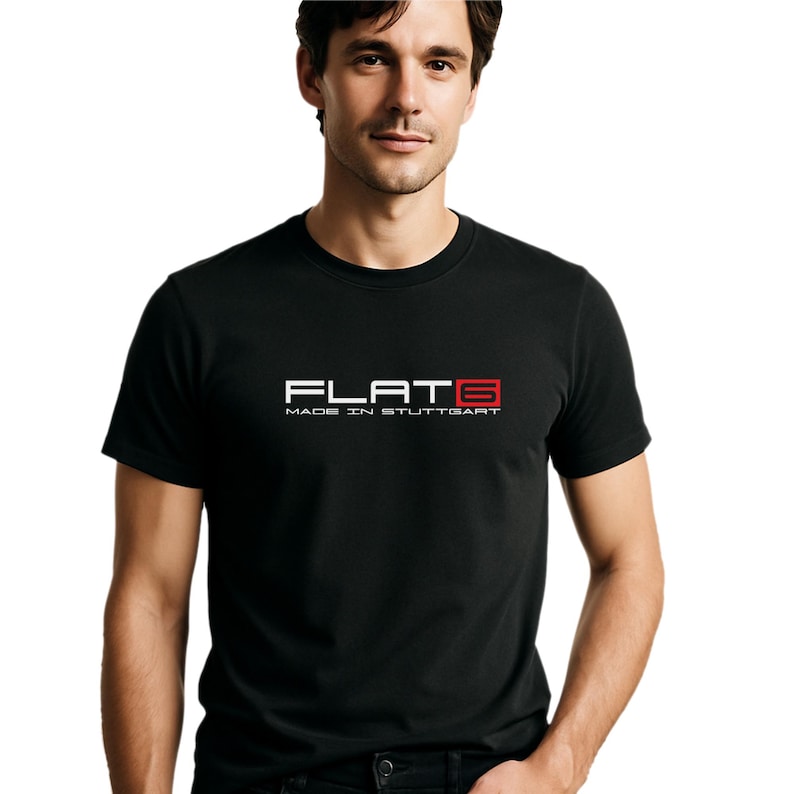 Front view of a black t-shirt with "FLAT SIX MADE IN STUTTGART" text, linking to 911 racing culture.