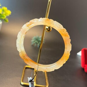 62MM Authentic Burmese Jadeite Bracelet Bangle Hand-Carved Floral Motif in Orange to Honey Yellow | Natural Grade A Jade Good Luck Talisman