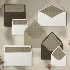 May include: An assortment of envelopes in various sizes and colors. The envelopes are white, brown, and tan, with a patterned interior lining. The pattern is a repeating geometric design in shades of brown and white. The envelopes are arranged on a neutral background.