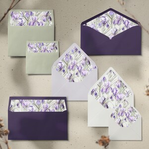 May include: An assortment of envelopes in various sizes and colors. The envelopes are sage green, white, and deep purple. Each envelope has a floral iris pattern lining the inside. The iris flowers are purple and white.