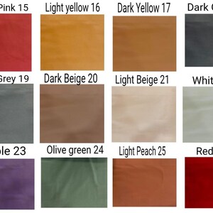 May include: A colour chart displaying a range of swatches. The chart includes colours like light pink, light yellow, dark yellow, dark grey, light grey, dark beige, light beige, white, purple, olive green, light peach, and red, each labelled with a number.