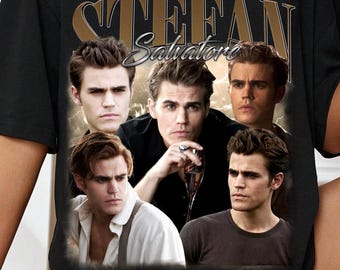 May include: Black t-shirt featuring a collage of images of Stefan Salvatore with the name "Stefan Salvatore" in a gold font. The shirt has a vintage, distressed look.