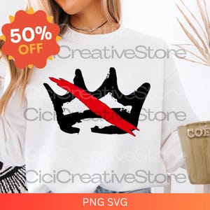 May include: White sweatshirt featuring a black crown design with a red slash through it. The text "CiciCreativeStore" is repeated multiple times. A 50% off sticker is visible.