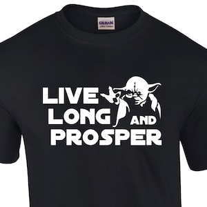 May include: Black t-shirt with a white graphic of Yoda from Star Wars. The graphic says "Live Long and Prosper".