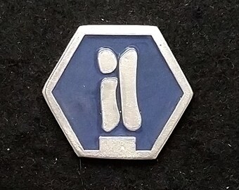 May include: A silver hexagonal pin with a blue background and a white stylized "II" symbol.