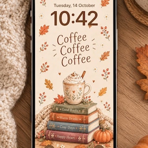 Può includere: Uno smartphone che mostra uno sfondo digitale color crema con foglie autunnali, bacche e piccoli fiori. Lo schermo indica l'ora 10:42, il testo Coffee Coffee Coffee, una tazza con panna montata e una pila di libri con le scritte Good Books, Warm Drinks, Cosy Days e Happy Heart.