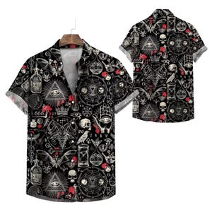 May include: Black button-up short-sleeve shirt with a repeating pattern of occult symbols, including eyes, skulls, and geometric shapes. Red accents and the number "666" are incorporated into the design. The shirt is displayed on a wooden hanger.
