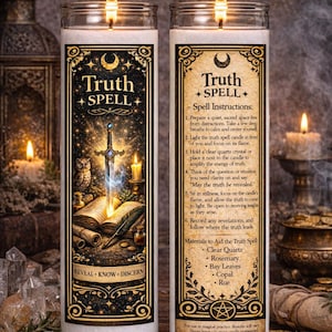 May include: Two white pillar candles with gold and black labels that read "Truth Spell." The labels feature illustrations of a sword, an owl, and an open book. The candles are lit, with flames at the top.