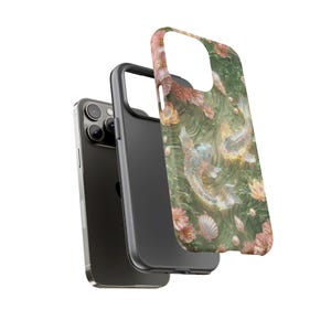 Exploded product view of the green floral koi fish phone case, showing the printed outer shell separated from the black inner layer and fitted frame.