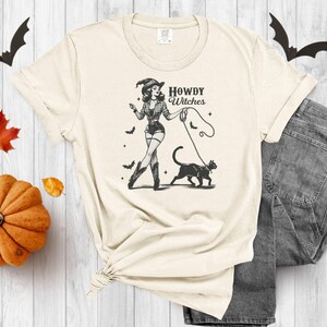 Howdy Witches Retro Graphic Tee: Western Cowgirl Halloween Shirt