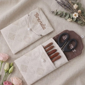 May include: A set of three ceramic mugs with a speckled, matte finish. The mugs are in shades of cream, light brown, and dark brown. Each mug has a simple, minimalist design and a rounded handle. Perfect for coffee or tea.