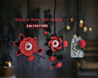 Puede incluir: Abalorios de coche de ganchillo Gothic Rose en rojo, negro y verde. Los abalorios presentan un diseño de rosa con un centro de globo ocular y un abalorio en forma de lápida con una rosa. El texto "Gothic Rose Car Charm" y "3 IN 1 PATTERN" es visible.