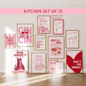 May include: A set of 12 kitchen wall art prints featuring pink and red illustrations of food, drinks, and text. Designs include wine glasses, spaghetti, a record player, and phrases like 'Buon Appetito', 'Pasta Lover Club', and 'What's For Dinner'.