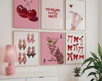 May include: A collection of framed art prints with a pink and white color scheme. The prints feature images of cherries, high heels, bows, a martini, and the text "You're like really pretty."