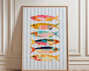 May include: A framed vertical wall art print featuring six stylized fish stacked horizontally. The fish are rendered in vibrant shades of pink, yellow, teal, orange, and blue against a background of vertical light blue and white stripes.