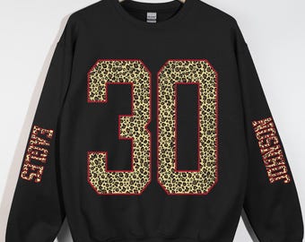 Sudadera personalizada con estampado de leopardo y número para aficionados al deporte, ropa para el día del partido y ropa de equipo.