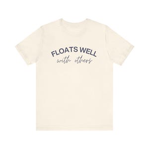 Neutral cream t-shirt with fun summer print, ideal for beach trips, lake cabins, or bachelorette weekends.