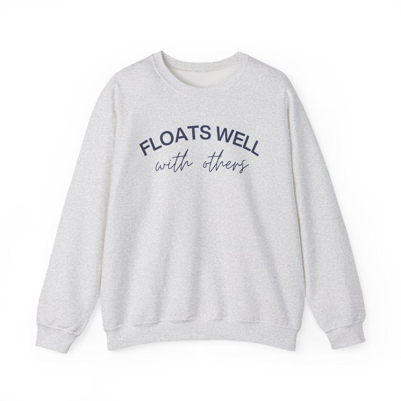 Heather grey float tee styled for casual summer days, poolside hangouts, and floating with friends.