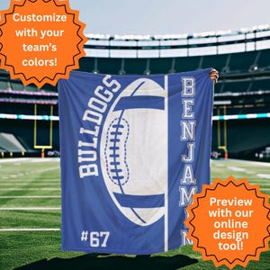 May include: A blue blanket featuring a white football graphic and the word "BULLDOGS". The name "BENJAM" is printed vertically on the right. The number "67" is at the bottom. The blanket is displayed against a football field background.