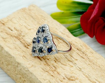 Oval Blue Sapphire Ring: Sterling Silver & White Topaz Accent