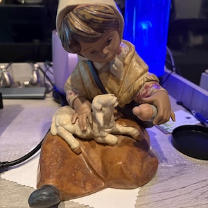 May include: A rustic wooden sign with the text "Welcome to our home" in white lettering. The sign features a distressed finish and a simple, inviting design, perfect for a front porch or entryway.