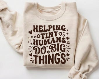 Sudadera "Ayudando a los pequeños humanos a lograr grandes cosas", regalo retro de agradecimiento para maestros, suéter bonito para primaria, cuello redondo para la vuelta al cole