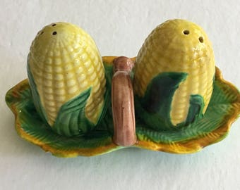 Vintage corn glazed salt and pepper shakers on a basket in green and yellow made in Japan cottage core summer time unusual