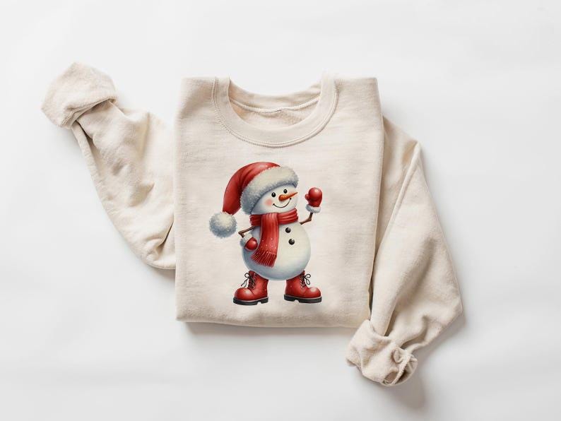 Pu&ograve; includere: Felpa color crema con grafica di pupazzo di neve. Il pupazzo di neve indossa cappello, sciarpa, guanti e stivali rossi. Il disegno &egrave; centrato sul davanti del top a maniche lunghe, perfetto per l'inverno o le festivit&agrave;.