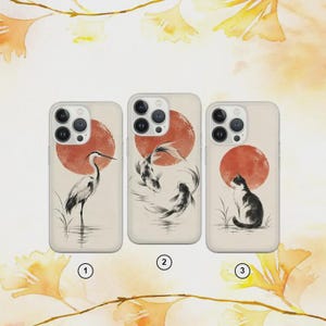 May include: Three phone cases with a cream background and a red sun motif. Case 1 features a crane, case 2 shows two koi fish swimming in a circle, and case 3 depicts a sitting cat. Each case is numbered 1, 2, or 3 at the bottom center.