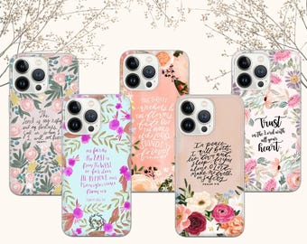 May include: Five smartphone cases featuring floral patterns and religious text. The cases display various color palettes including light blue, peach, and white, with script lettering quoting Psalms and Isaiah. Each case has a camera cutout.