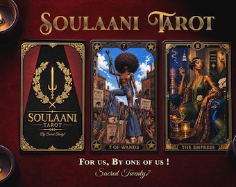 May include: Three rectangular tarot cards from the Soulaani Tarot deck. The left card features a gold sword and laurel wreath logo. The center card, 7 of Wands, shows a person with an afro holding a staff. The right card, The Empress, depicts a seated figure.