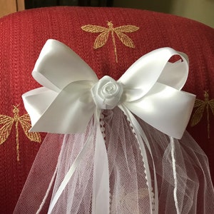First Communion/Flower Girl  Veil attached to a  White or Ivory Satin  Bow with Rose Center with Ribbon  and Pearl Streamers, Boutique Bow