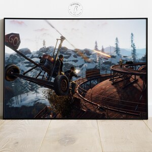 Pode incluir: Impressão de arte emoldurada com uma cena de ação dinâmica com uma aeronave improvisada e figuras atirando com armas. A obra de arte é ambientada em um cenário de montanhas nevadas com uma estrutura industrial enferrujada. A palavra "GO" é visível.
