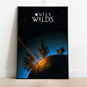 May include: A framed art print featuring the words "OUTER WILDS" in white against a dark blue starry sky. The image depicts a planet with trees and a spacecraft, illuminated by a beam of light.