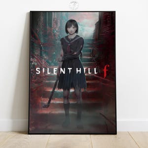 May include: Framed poster with the words "SILENT HILL f". It depicts a person in a dark school uniform, holding a weapon, on a staircase. The background is a dark, ominous setting with red vines. The poster is in a black frame.