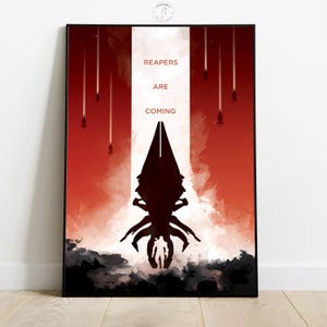 May include: Framed art print with a red and white background. The print features a black silhouette of a creature with the text "REAPERS ARE COMING". The artwork has a minimalist design with a sci-fi theme.