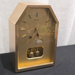 Vintage Seiko Melody Quartz Mantle Clock Gold Rotating Pendulum Japan "WORKS"