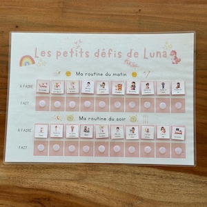 Peut inclure: Un tableau de tâches rose et blanc avec le texte "Les petits défis de Luna", "Ma routine du matin" et "Ma routine du soir". Le tableau comporte des tâches illustrées et des espaces pour l'achèvement.