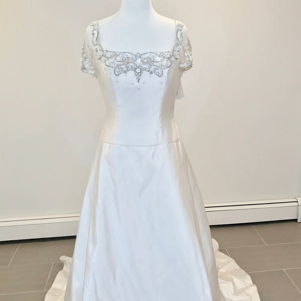 Beautifully designed wedding dress by Givenchy size 8