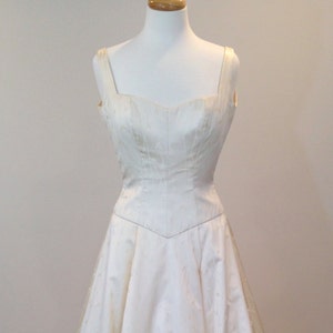 This is a Gorgeous wedding dress by Carmela Sutera size 6 image 1