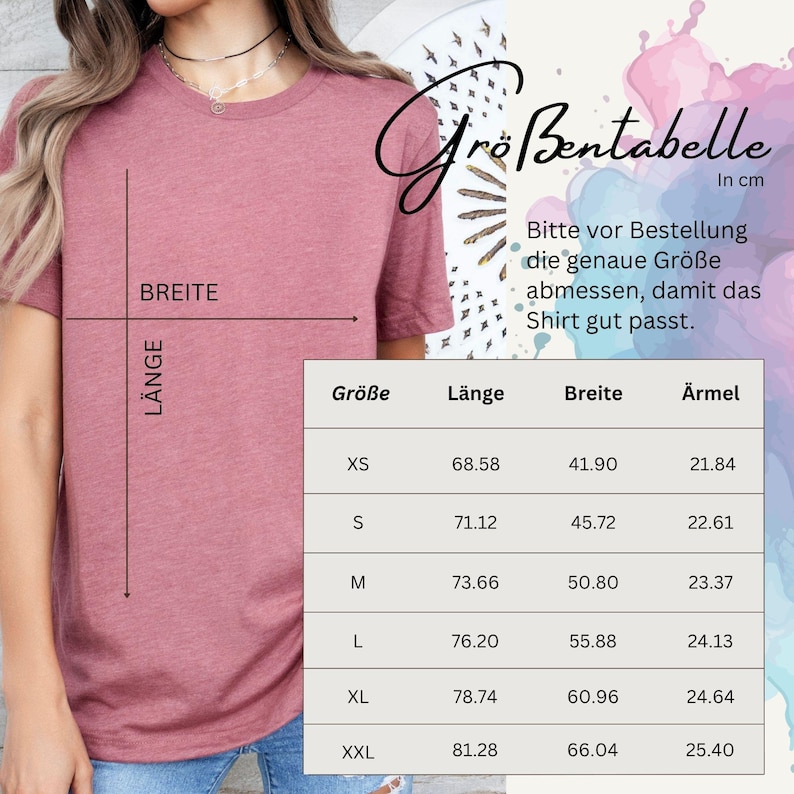 May include: A dusty rose t-shirt with a size chart in centimeters. The chart includes measurements for length, width, and sleeve length for sizes XS to XXL. The text on the chart advises to measure the exact size before ordering to ensure a good fit.
