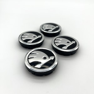 4 x Original Skoda wheel center caps hub caps 5E0601151 5JA 601 151A