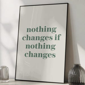 May include: A set of three ceramic mugs with a speckled, matte finish in cream, light grey, and dark grey. Each mug has a simple, minimalist design, ideal for coffee or tea.