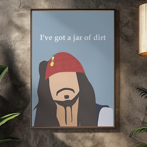 May include: Framed art print featuring a stylized illustration of a character with long black hair, a red bandana, and a goatee. The print has the text "I've got a jar of dirt" on a blue background. The artwork is displayed above a reception desk.