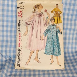 May include: Vintage Simplicity pattern 4972 featuring illustrations of women's sleepwear. The pattern packet shows a pink robe, a blue patterned robe, and a yellow coat. The text on the packet reads "Simplicity Printed Pattern 35c".