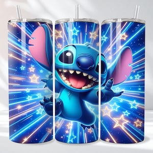May include: A stainless steel tumbler featuring a vibrant illustration of the character Stitch from Lilo & Stitch. The design includes a smiling Stitch against a blue background with star and light ray accents. Includes a straw.