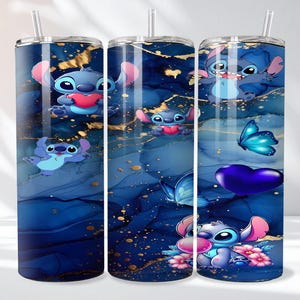 May include: Three stainless steel tumblers with a blue and gold abstract design. Each tumbler features the cartoon character Stitch, with hearts and butterflies. The tumblers have a straw and are decorated with flowers.