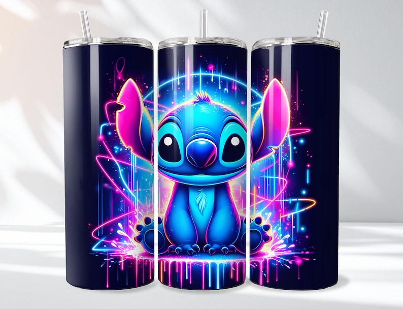 May include: Three navy blue insulated tumblers with a vibrant cartoon illustration of Stitch. The design features Stitch in shades of blue, with pink and purple neon accents. Each tumbler has a silver straw.
